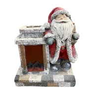 פסל סנטה ליד האח עם תאורת LED